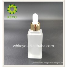 20ml Hot sale high quality square colored empty cosmetic packing glass dropper bottle